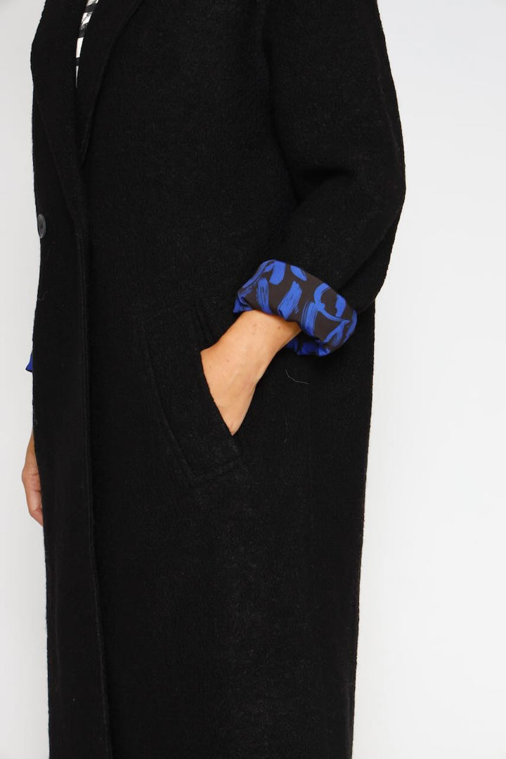 ABRIGO MILLIE BOILED-NEGRO